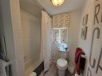 ensuite bath with tub/shower in master bedroom suite